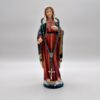 Autorosenkranz Hämatit mit grüner Kordel hängt an Marienstatue