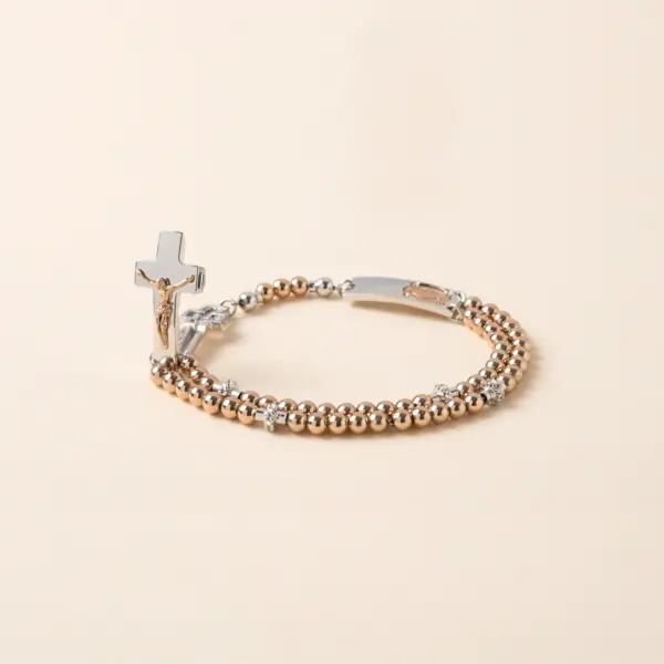 Rosenkranz Armband Rosalet in Rosegold und Silber mit Kristallbesatz und geöffneten Kreuz.