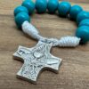 Kommunionkreuz von geschlossener 10er Rosenkranz mit türkisenen Perlen