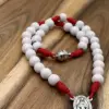 Wundertätige Medaille und Magnetverschluss des Autorosenkranz Benediktus Holz