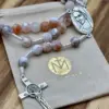 Medjugorje-Mittelstück des Feuerachat-Rosenkranzes mit Geschenkbeutel