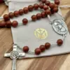 Rosenkranz Medjugorje Goldfluss mit dem Geschenkbeutel der Rosenkranz Werkstatt
